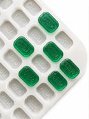 4-mL-Ziegel-Gummiform, 185 Kavitäten — schräge Draufsicht mit smaragdgrünen CBD-Gummies