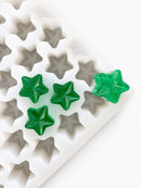4-mL-Stern-Gummiform - 168 Kavitäten - Produktansicht, auf weißem Hintergrund, mit smaragdgrünen Gummis